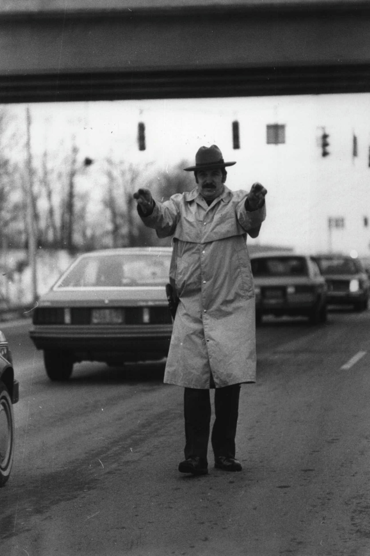 Guilderland, New York police officer directs Route 20 traffic - Western Avenue instersection with Northway. January 27, 1984 (Jack Madigan/Times Union Archive)