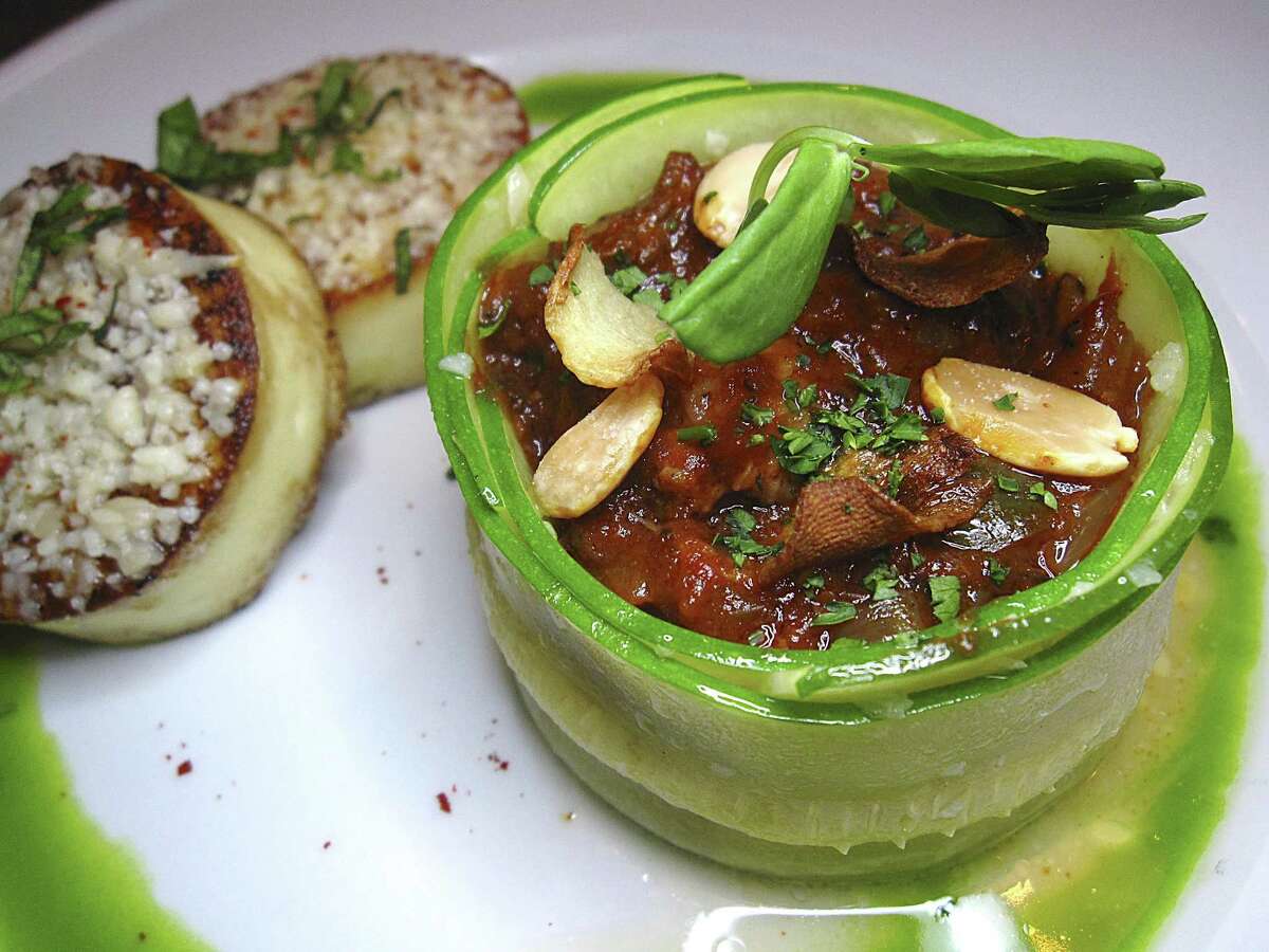 Pork sauce-piquante wrapped in zucchini with gnocchi alla romana from Cookhouse Restaurant.