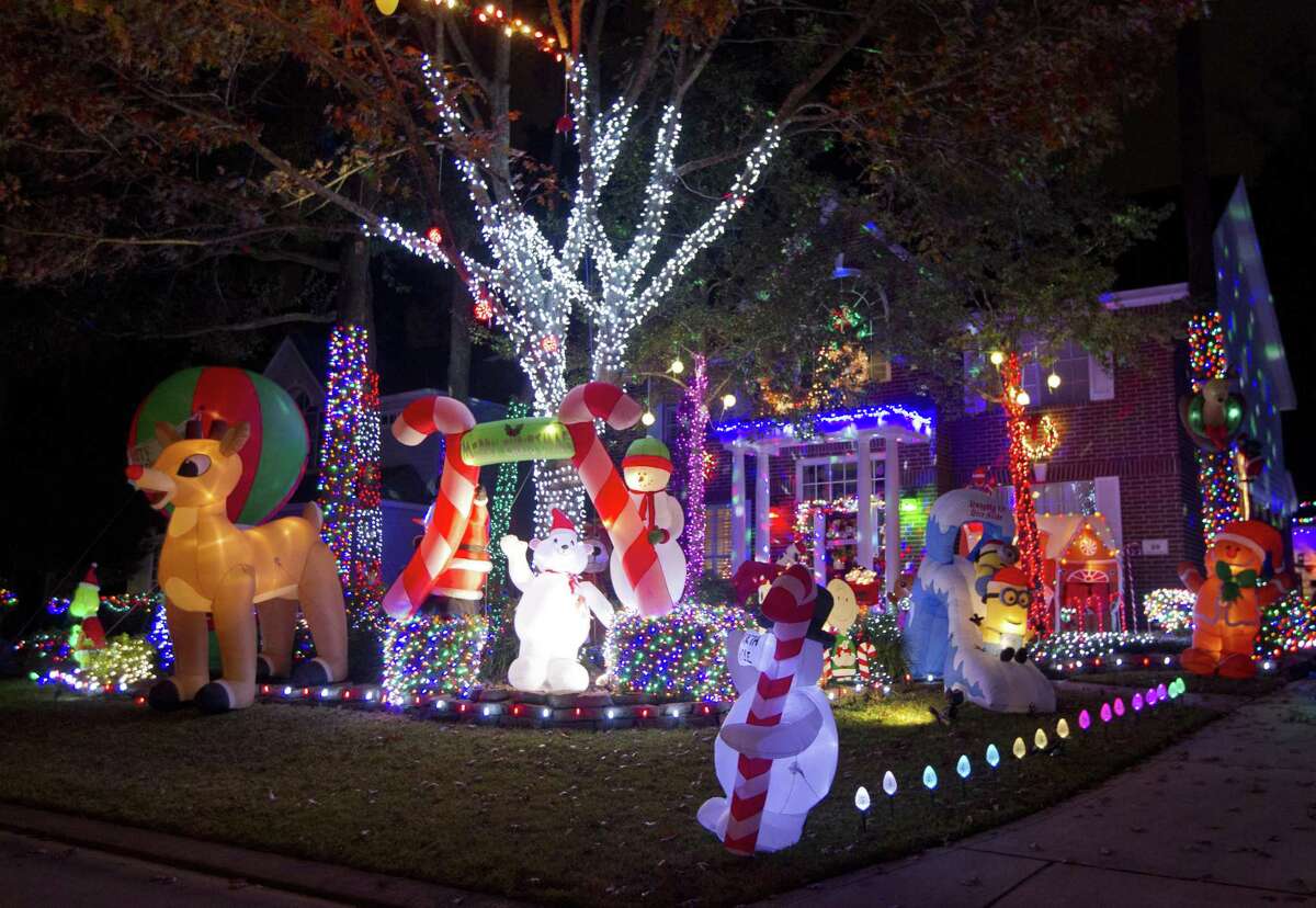 Holiday lights adorn the home of Vivian and Ross Kruchten on Edgemire Place, Wednesday, Dec. 12, 2018, in The Woodlands.