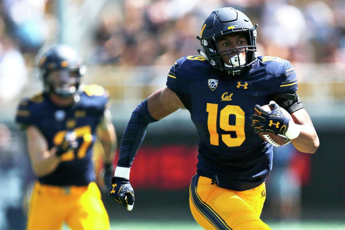 California Golden Bears linebacker Cameron Goode (19) intercepts the ball against the North Carolina Tar Heels and scores a touchdown during an NCAA football game at Memorial Stadium, Saturday, Sept. 1, 2018, in Berkeley, Calif.