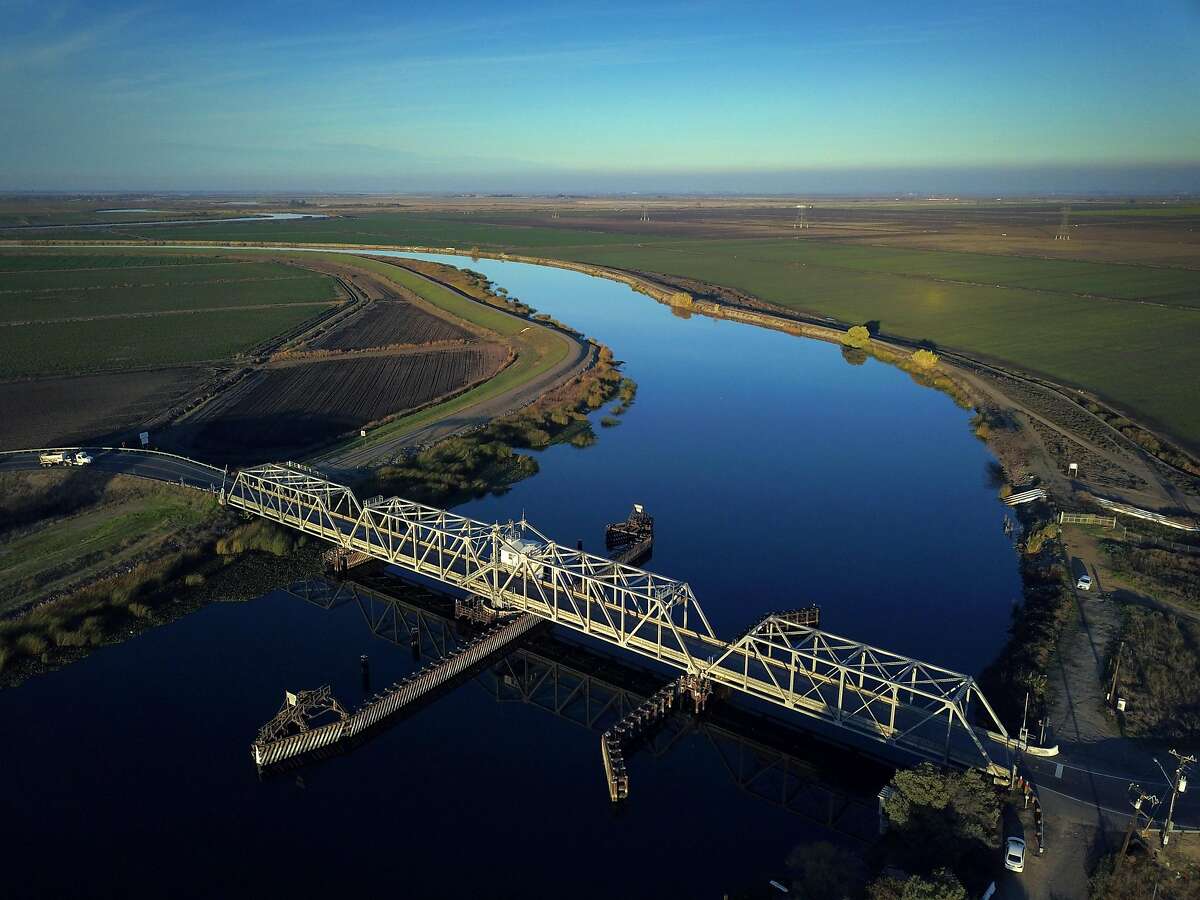 Old River with its bridge visible at the bottom, runs through farmland in the Sacramento-San Joaquin Delta outside Discovery Bay, Calif., on Tuesday, December 11, 2018. On Wednesday, the Legislature is expected to vote on a massive water bill which could decide the fate of the state's water, pitting environmentalists and sportsmen against farmers and city dwellers. No matter how the vote goes, someone will be unhappy, either the cities and suburbs, or the ranchers/farmers or the environmentalists.
