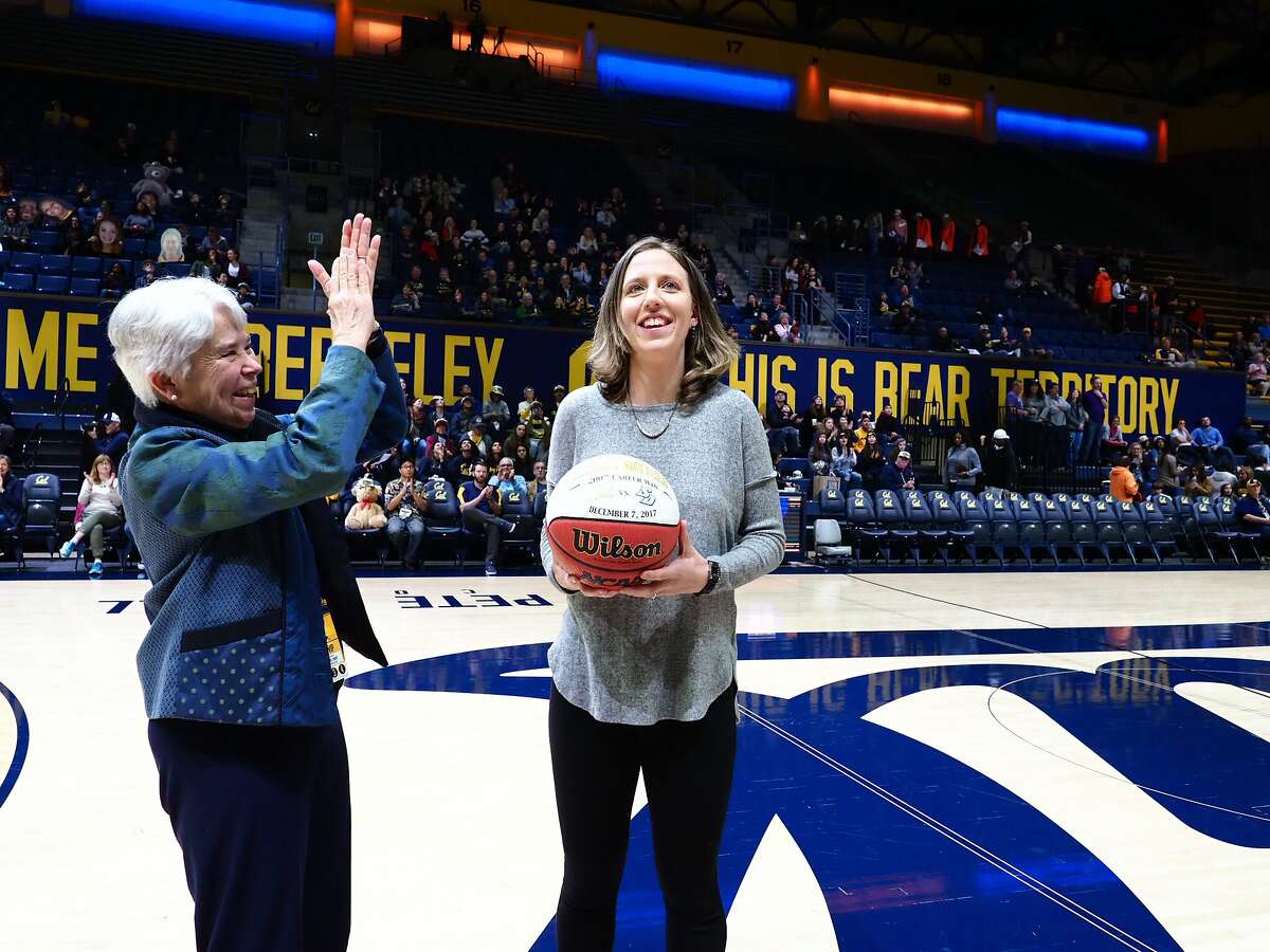 Cal women�s basketball Head Coach Lindsay Gottlieb was recognized for her 200th collegiate win (which she earned on Dec. 7, 2017 ) before a women�s basketball game at Hass Pavillion in Berkeley on Friday, January 12, 2018. UC Berkeley Chancellor Carol Christ presented Caoch Gottlieb will a commemorative ball insribed with the date of her achievemnt.