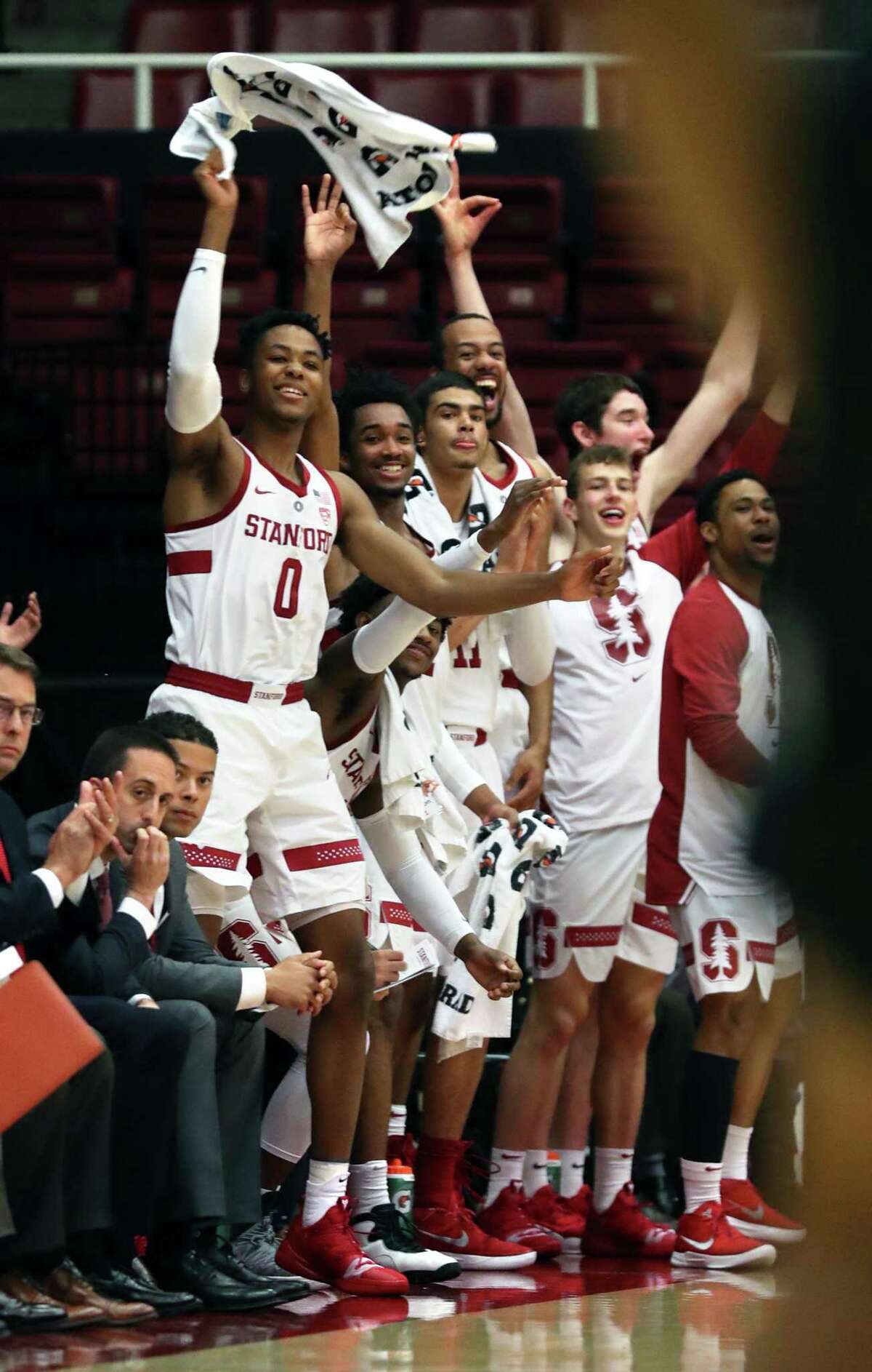 Stanford's KZ Okpala (0) and the Cardinal bench cheer a 3-pointer against Portland State in 1st half during NCAA men's basketball game at Maples Pavilion in Stanford on Wednesday, November 28, 2018.