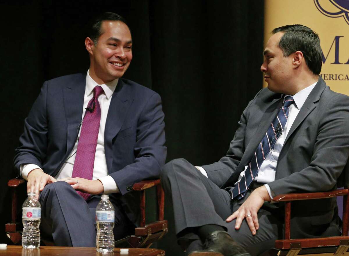 Former San Antonio Mayor and Secretary of Housing and Urban Development, Julian Castro, (left) and twin brother U.S. Rep. Joaquin Castro, D-San Antonio, joke during the Making the Grade: A Conversation with Julian, Joaquin, and Rosie Castro event held Monday Feb. 19, 2018 at the Prothro Theater in the Harry Ransom Center on the University of Texas at Austin campus in Austin, Tx.