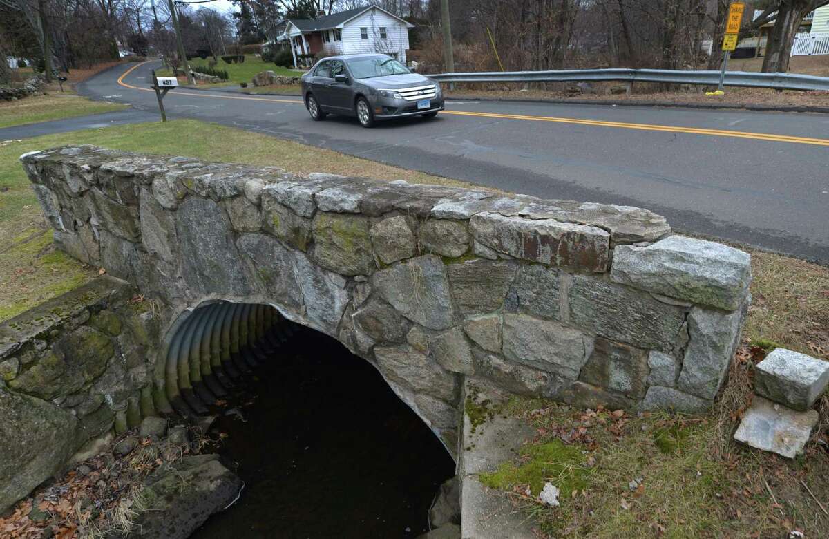 The bridge spanning Keeler Brook on Rowayton Ave. Friday, December 14, 2018, in Norwalk, Conn. Roughly half of the 26 Norwalk bridges measuring 20 feet or less in length were deemed as being as in ?‘fair or worse?’ shaped based upon a 2016 Connecticut Department of Transportation report. The bridges span everything from culvert pipes to streams. With the DOT no longer inspecting such small bridges, the Norwalk Common Council on Tuesday evening authorized the city?’s Department of Public Works to hire Freeman Companies, at a cost not to exceed $251,200, to evaluate the 26 bridges.