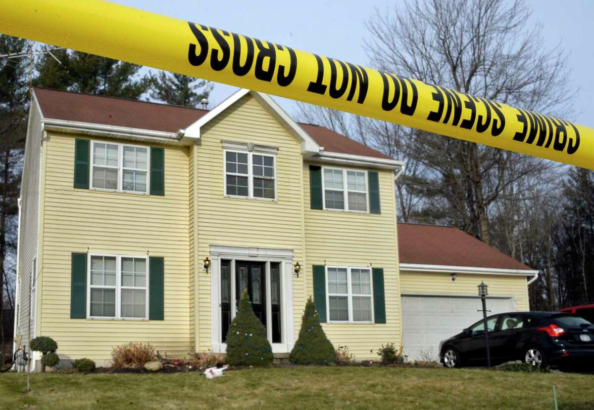 Crime scene tape surrounds 723 Adams Circle Saturday Dec. 15, 2018 in Ballston Spa, NY. Three bodies were discovered inside the single-family home on Friday. (John Carl D'Annibale/Times Union)