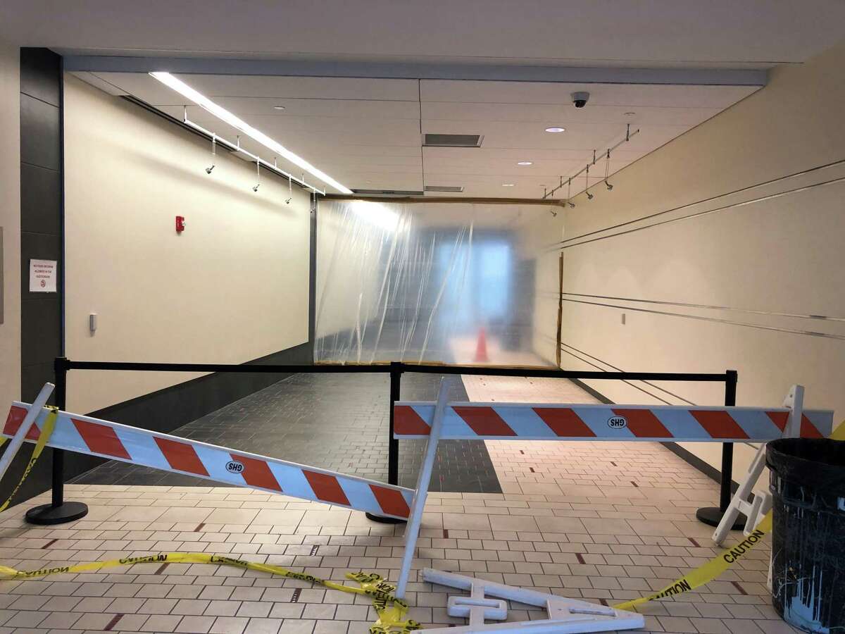 The hallway is blocked at Greenwich High School after a broken pipe caused a flood earlier this week. This show the intersection of the PAC hallway and the science hallway on Friday.