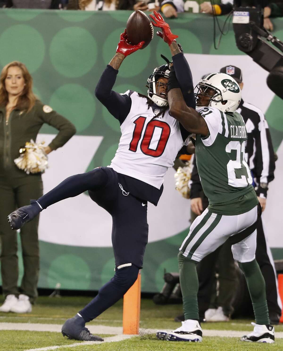 Houston Texans wide receiver DeAndre Hopkins (10) beats New York Jets cornerback Morris Claiborne (21) for a 14-yard touchdown reception during the fourth quarter of an NFL football game at MetLife Stadium on Saturday, Dec. 15, 2018, in East Rutherford, N.J.