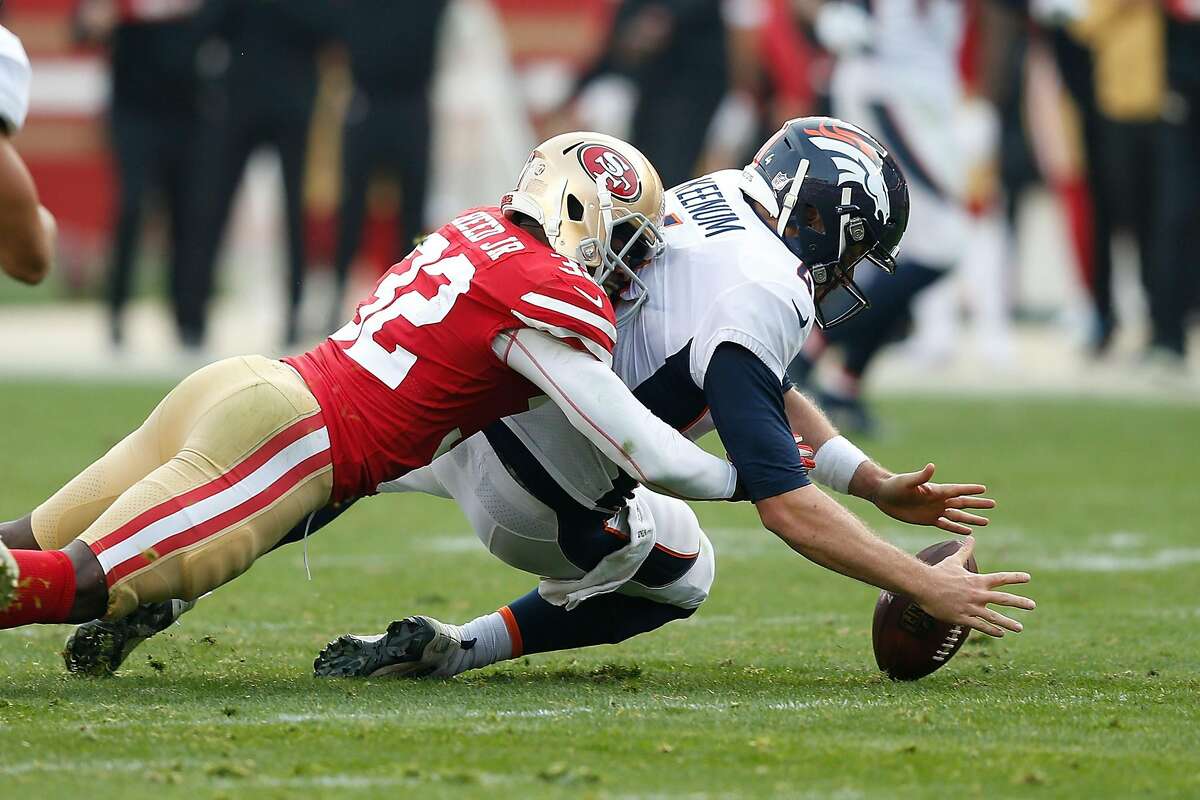 SANTA CLARA, CA - DECEMBER 09: Quarterback Case Keenum #4 of the Denver Broncos fumbles the ball while being sacked by D.J. Reed #32 of the San Francisco 49ers at Levi's Stadium on December 9, 2018 in Santa Clara, California. (Photo by Lachlan Cunningham/Getty Images)