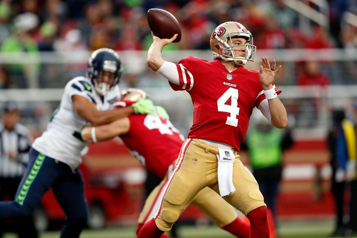 San Francisco 49ers' Nick Mullens passes in 2nd quarter against Seattle Seahawks during NFL game at Levi's Stadium in Santa Clara, Calif. on Sunday, December 16, 2018.