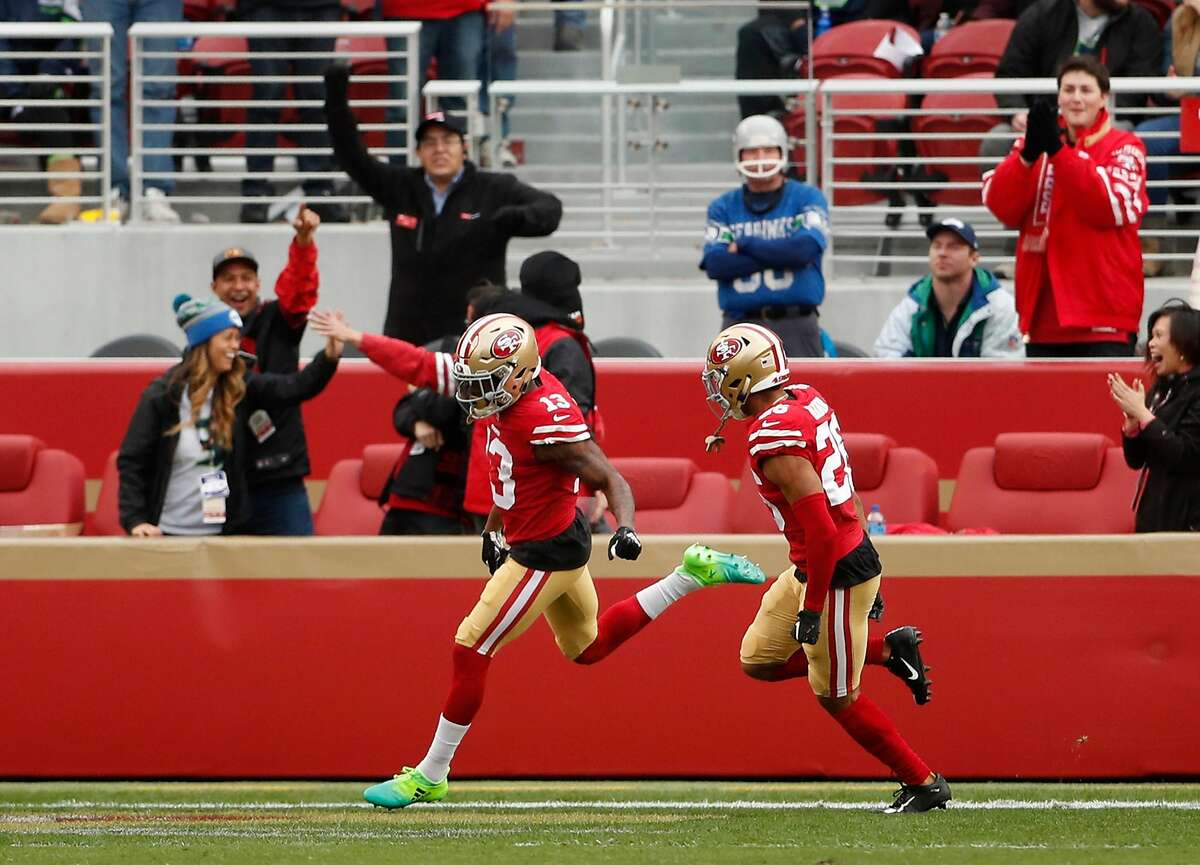 San Francisco 49ers' Richie James, Jr. (13) celebrates his kick off return for a touchdown in 1st quarter against Seattle Seahawks during NFL game at Levi's Stadium in Santa Clara, Calif. on Sunday, December 16, 2018.