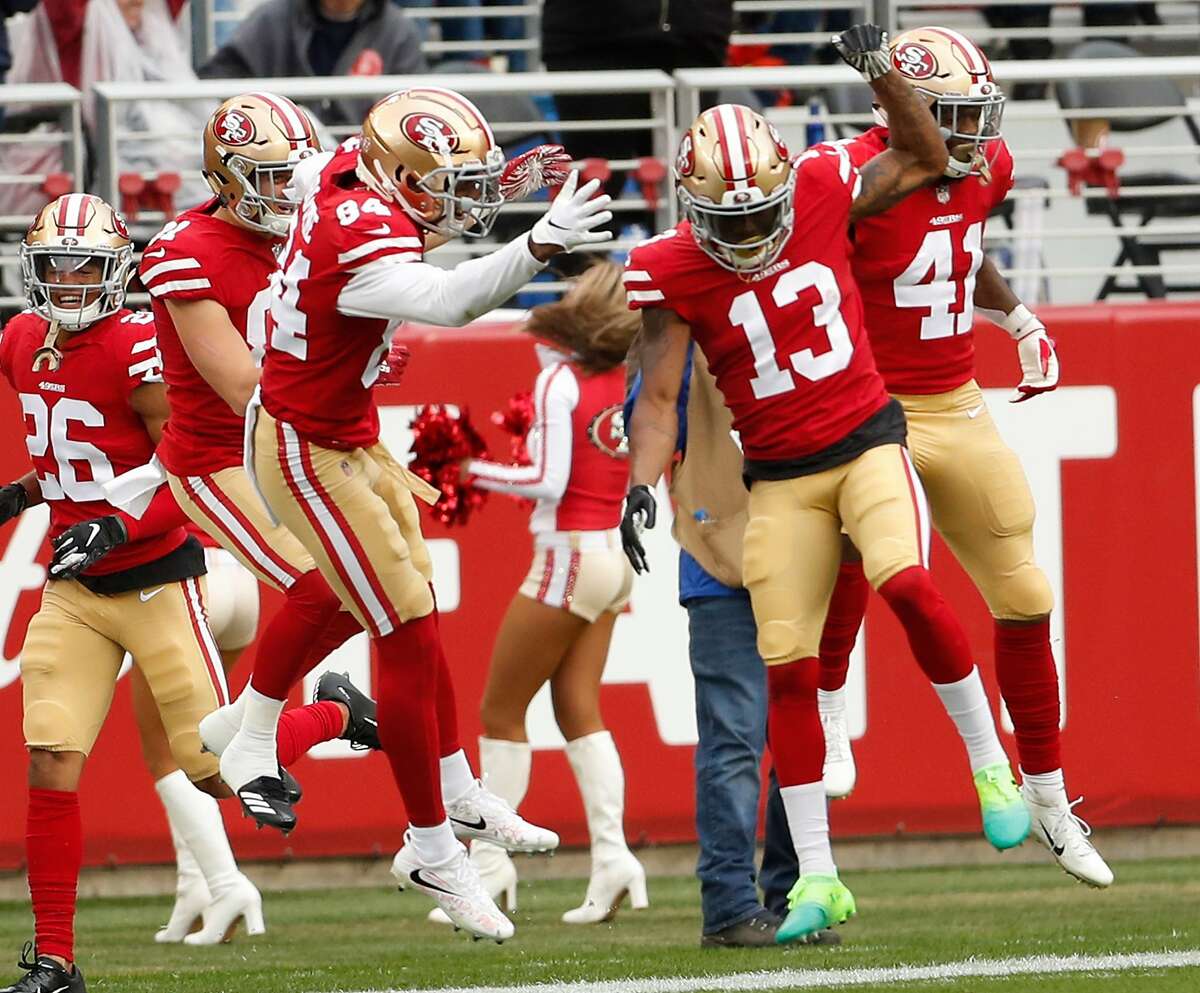 San Francisco 49ers' Richie James, Jr. (13) celebrates his kick off return for a touchdown in 1st quarter against Seattle Seahawks during NFL game at Levi's Stadium in Santa Clara, Calif. on Sunday, December 16, 2018.