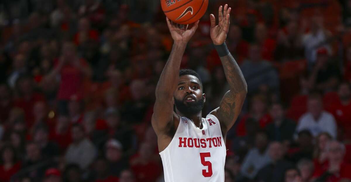 Houston Cougars guard Corey Davis Jr. (5) shoots a three point basket against the Saint Louis Billikens during the second half of an NCAA basketball game at the Fertitta Center Sunday, Dec. 16, 2018, in Houston. The Cougars won 68-64.