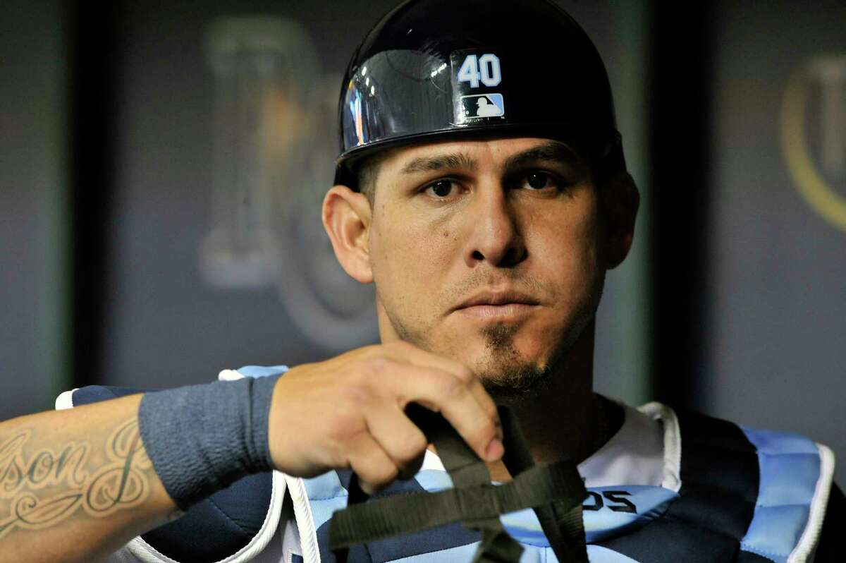FILE - In this July 9, 2018, file photo, Tampa Bay Rays catcher Wilson Ramos heads for the field during a baseball game against the Detroit Tigers, in St. Petersburg, Fla. The New York Mets have agreed to a $19.5 million, two-year contract with Ramos, according to a person familiar with the negotiations. The Mets will turn to the two-time All-Star, who is coming off a strong year with the Tampa Bay Rays and Philadelphia Phillies. The person spoke to The Associated Press on condition of anonymity Sunday, Dec. 16, 2018 because the deal has not been announced and is still pending a physical. (AP Photo/Steve Nesius, File)