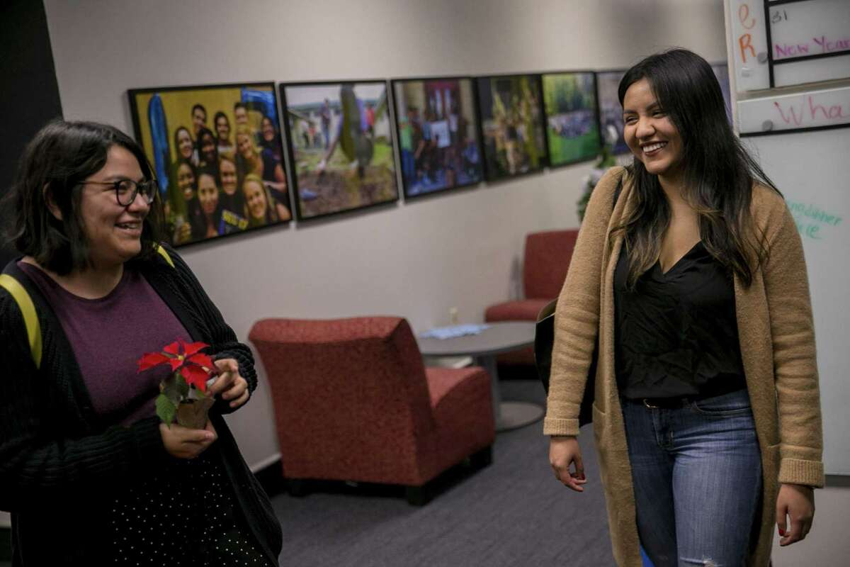 Jovahana Avila, 22, right, laughs with her sister Maricela Avila, 20, at St. Edward'ss University on Dec. 14, 2018. Avila had an unpaid internship in Washington, D.C., the summer of 2017 working for the EPA and managed to scrape together $400 for her spending money for the entire summer.