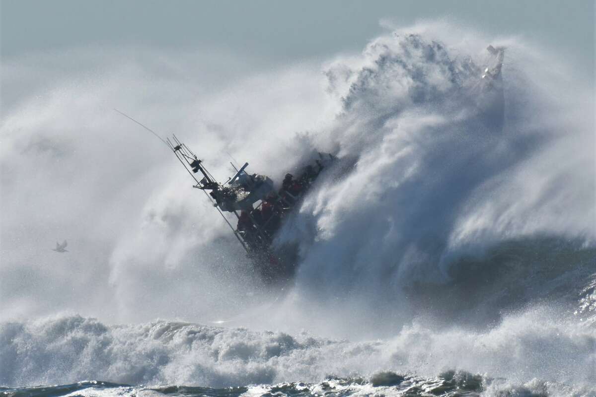 Dave Rogers of Pacifica captured two 47-foot-long motor lifeboats being tossed in big waves at San Francisco's Ocean Beach during a training by the U.S. Coast Guard's Golden Gate Station on Dec. 13, 2018. This was a standard training.