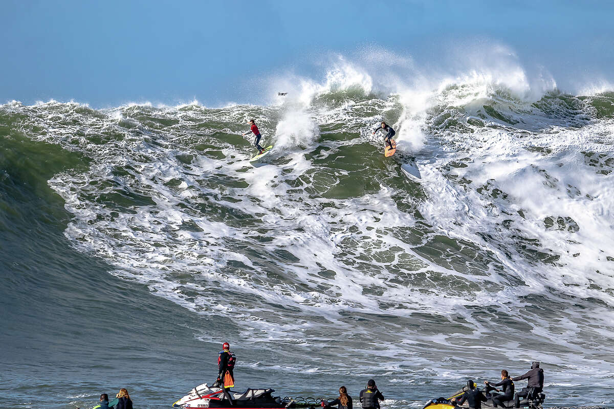 Surfers braved big waves at Mavericks Beach off Half Moon Bay on Dec. 17, 2018. The World Surfing League was eyeing the date last week for the annual surf contest, but decided conditions were too wild and dangerous.
