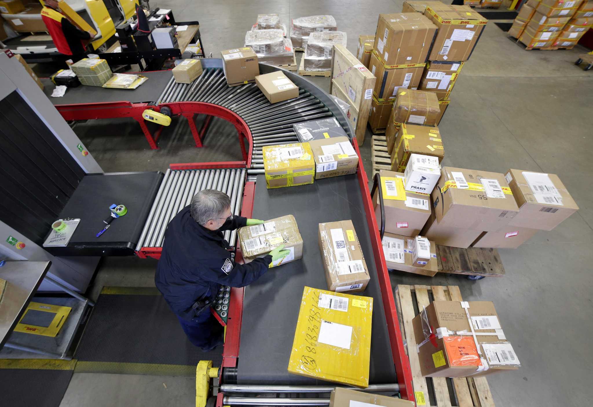 FedEx DHL coming to town bearing holiday packages