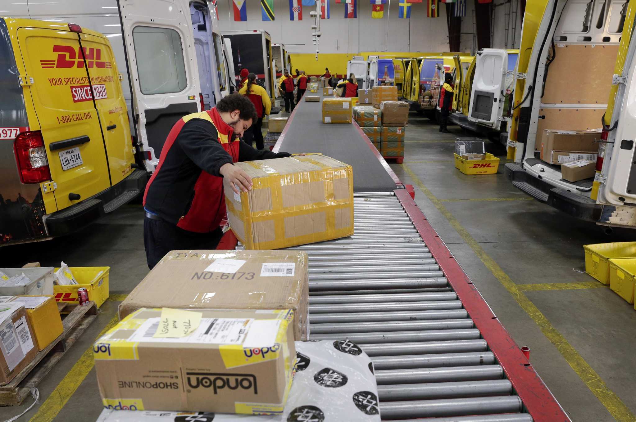 FedEx DHL coming to town bearing holiday packages