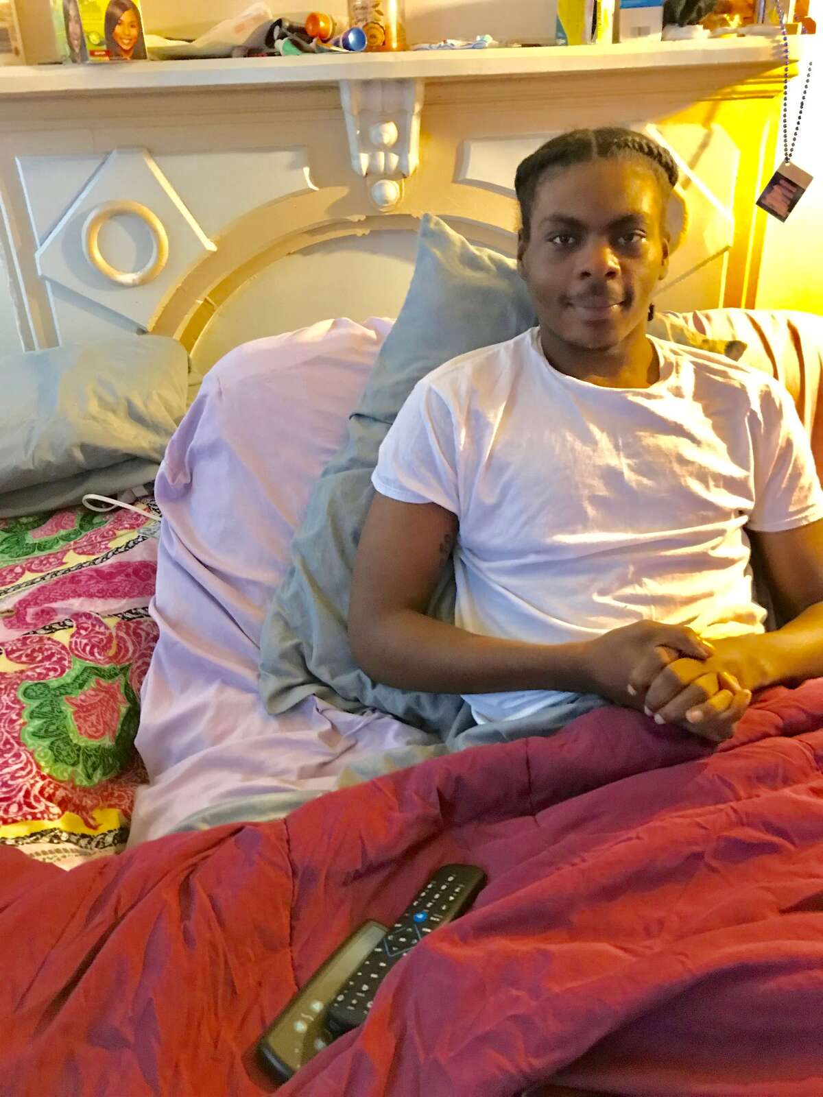 Ellazar Williams, in bed at his Albany apartment. He was paralyzed from the chest down after an Albany police officer shot him on Aug. 20, 2018. Alice Green, director of the Center for Law and Justice, has questioned the police account of the incident and has been working with Ellazar and his girlfriend to get them better situated with an accessible apartment among other needs.