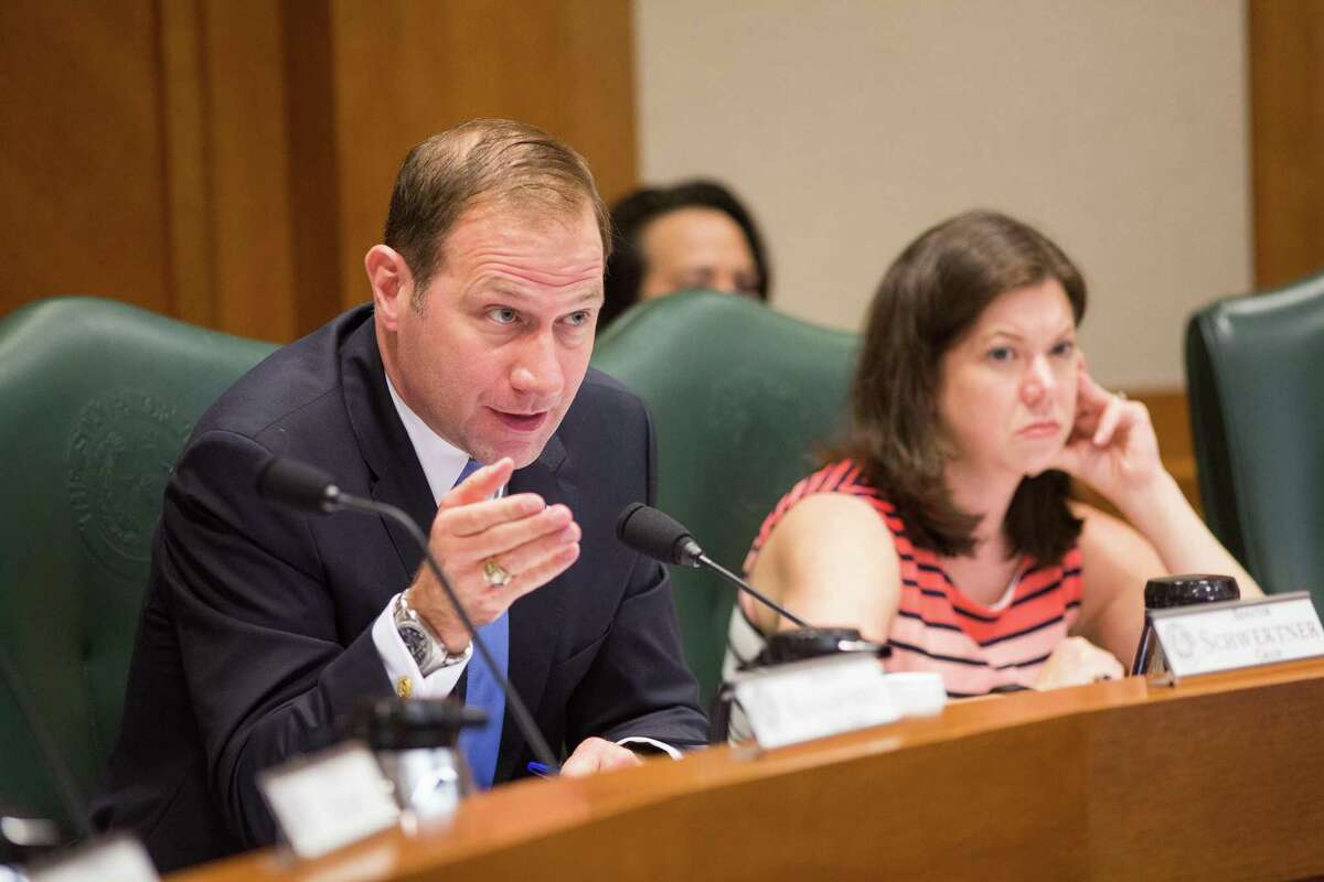 State Senator Charles Schwertner, Chair of the Texas Senate Committee on Health and Human Services, addresses Dr. John Hellerstedt, Commissioner of the Department of State Health Services, during a hearing May 17 to evaluate the state's ability to effectively respond to challenges posed by the Zika virus and explore what actions should be taken to prevent transmission, including mosquito control efforts. (Photos by Tom McCarthy Jr.)