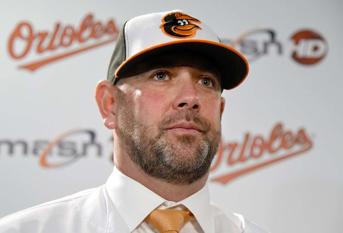 The Baltimore Orioles' new manager, Brandon Hyde, is introduced by General Manager Mike Elias at a press conference on Monday, Dec. 17, 2018. Hyde left the Chicago Cubs, where he was the bench manager, for his first job as a major league manager. (Amy Davis/Baltimore Sun/TNS)