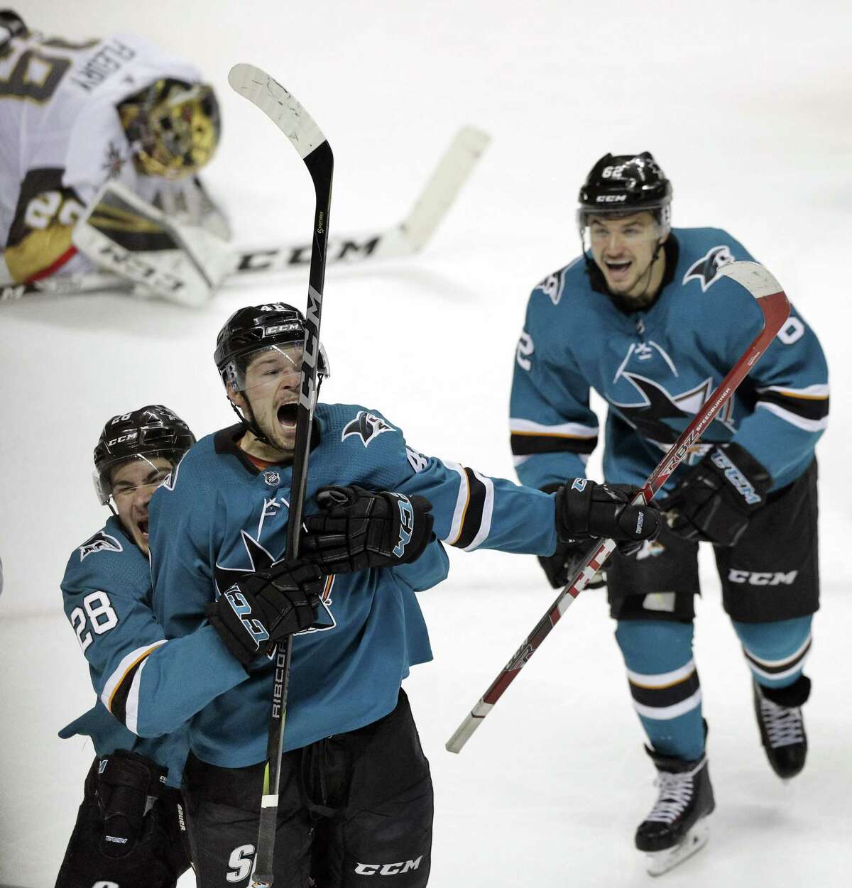 Tomas Hertl (48) celebrates his game-tying goal in the third period with Timo Meier (28) and Kevin Labanc (62) as the Sharks played the Vegas Golden Knights in Game 1 of the second round of the NHL Stanley Cup playoffs at SAP Center on April 30.
