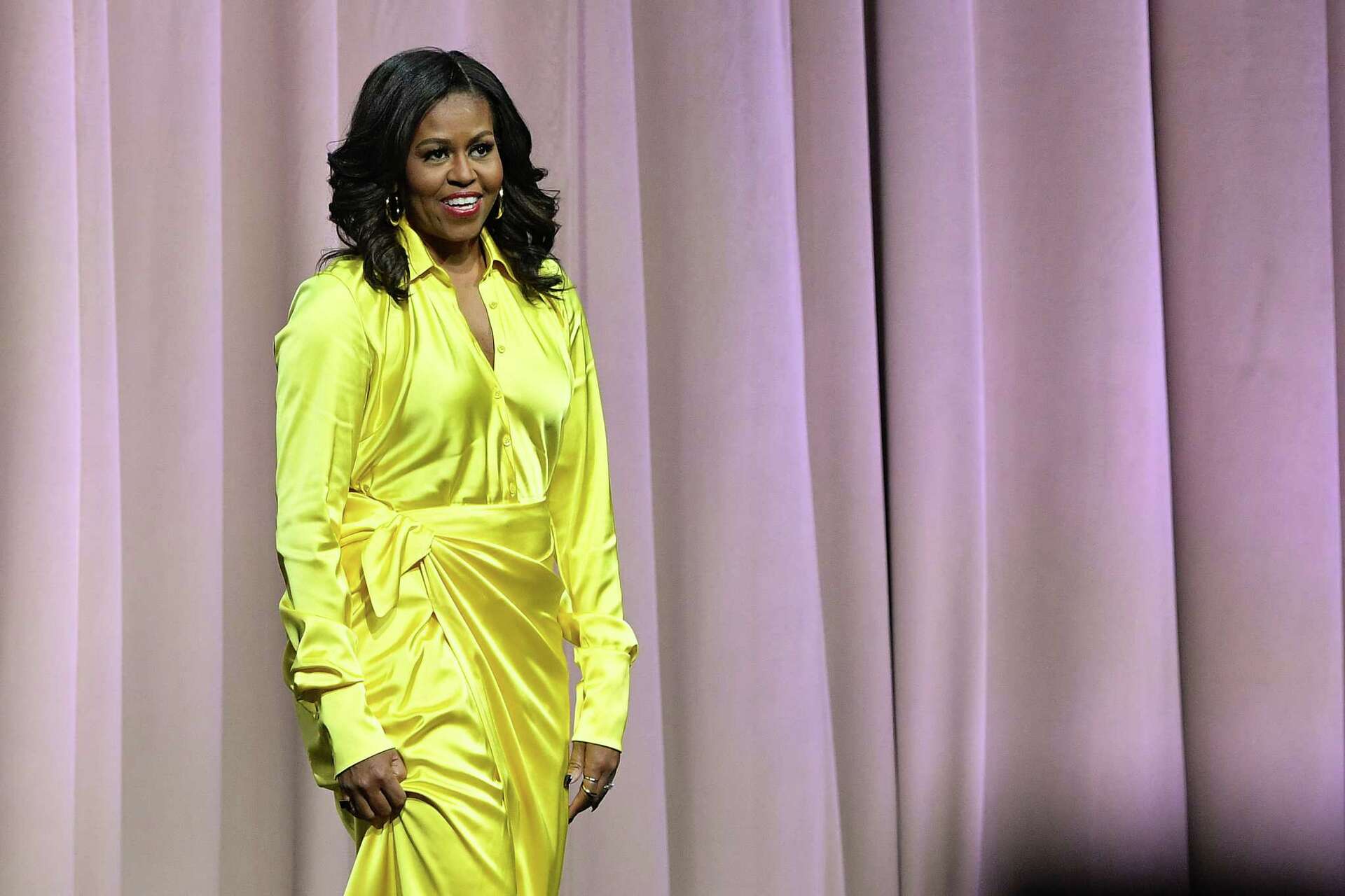 Michelle Obama rocks Balenciaga glitter boots on book tour