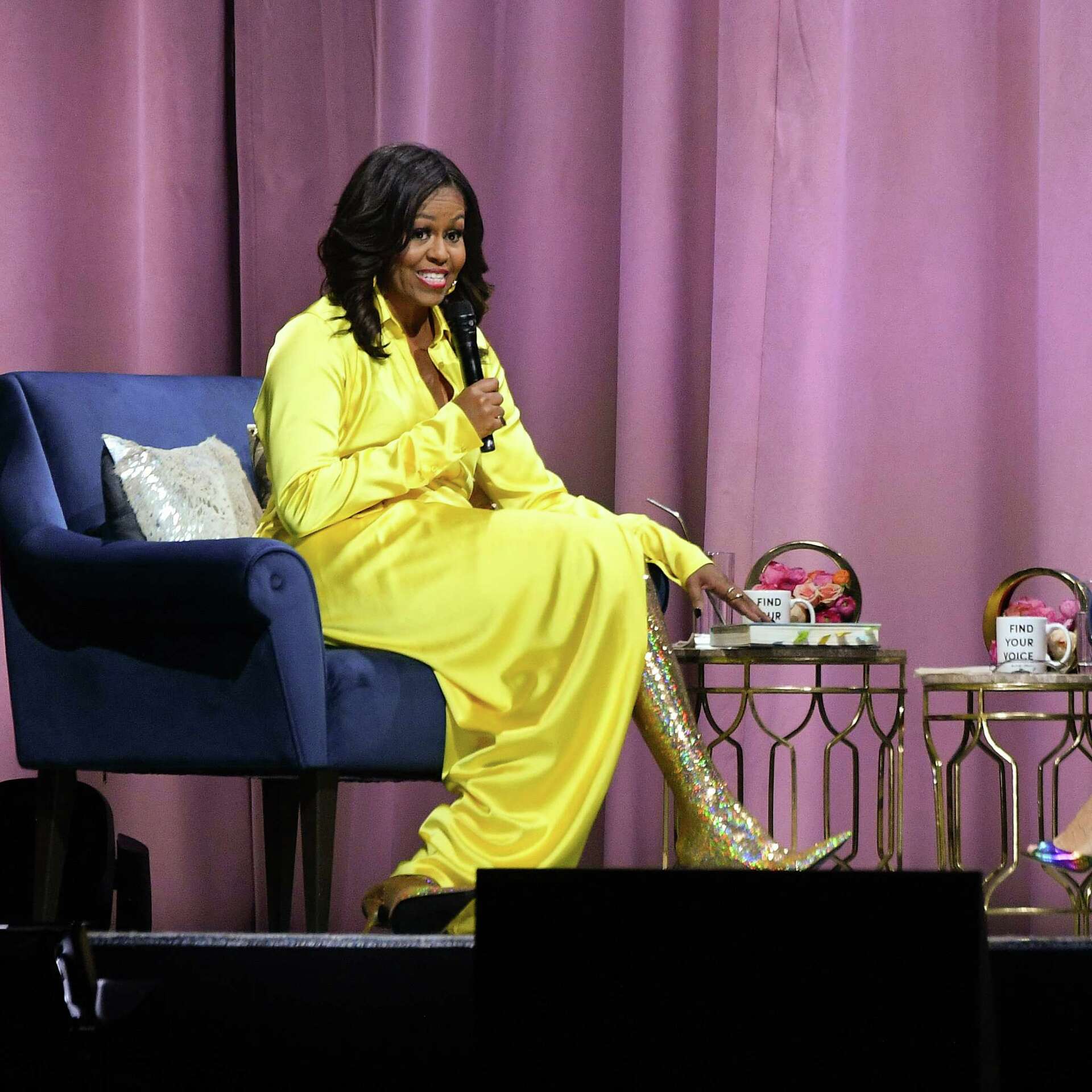 Michelle Obama rocks Balenciaga glitter boots on book tour