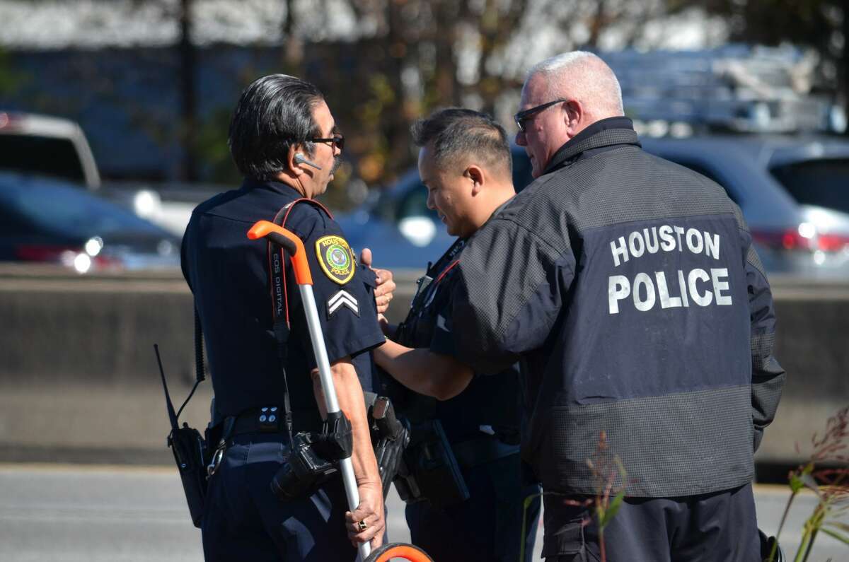 Houston PD says officer struck on motorcycle, collides with Harris Co