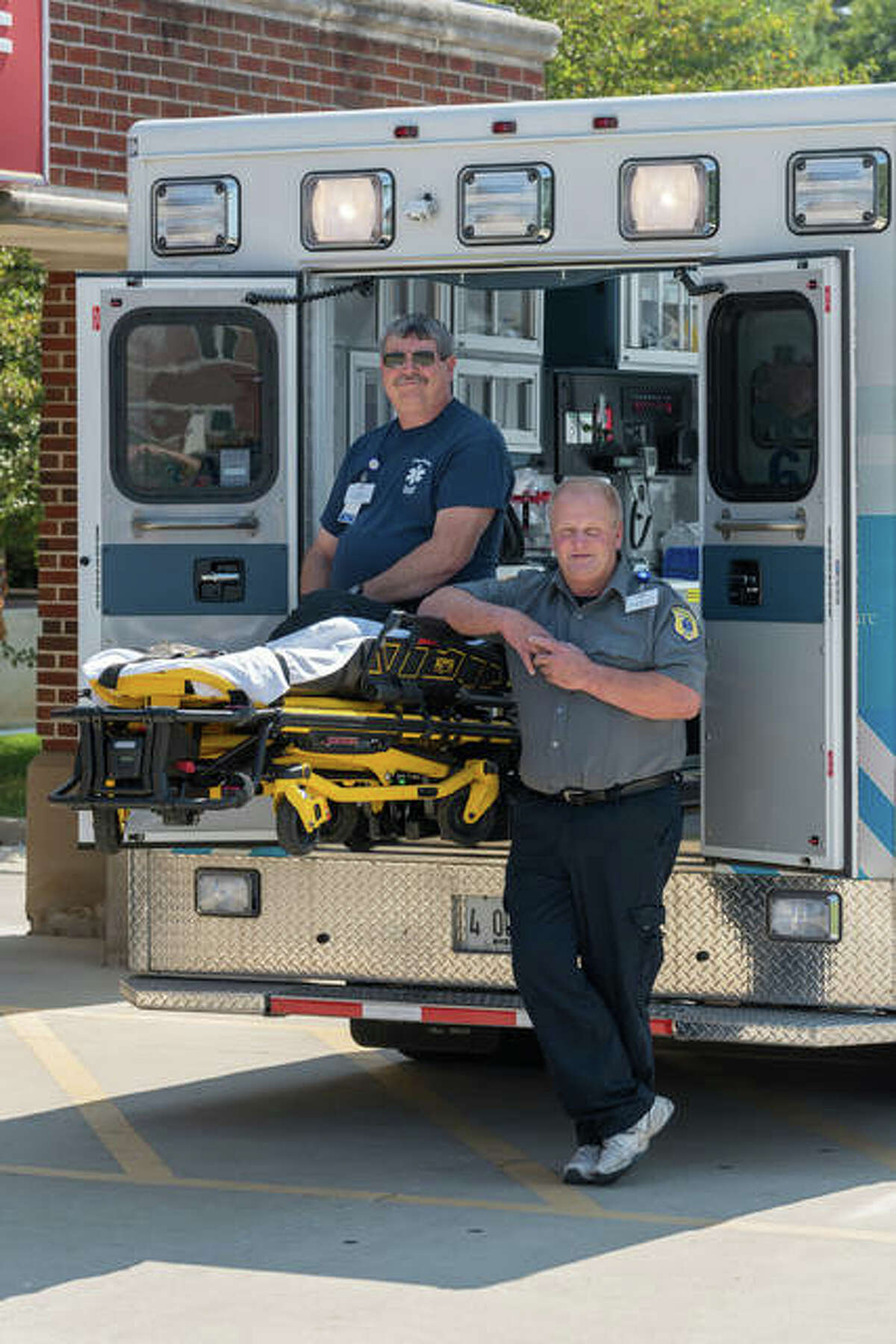 Rex Allen Book, left, and Dennis Eyer have been with Alton Memorial’s EMS team since it started in 1988.