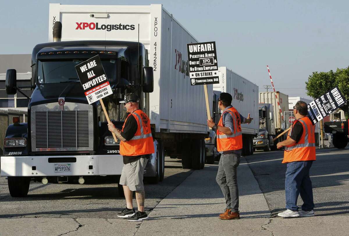 A group of port truck drivers picket XPO Logistics in Commerce, Calif., in 2017.