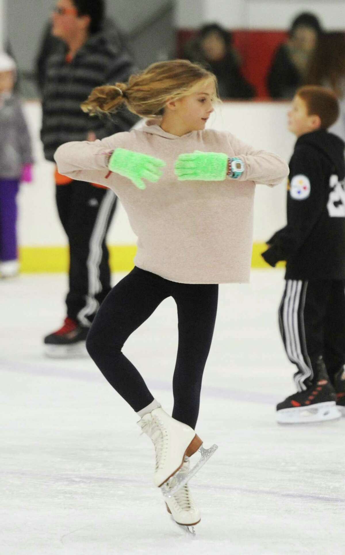 Hanna Klingbeil, 11, of Greenwich, does a spin during a public skating session at Hamill Rink last year.