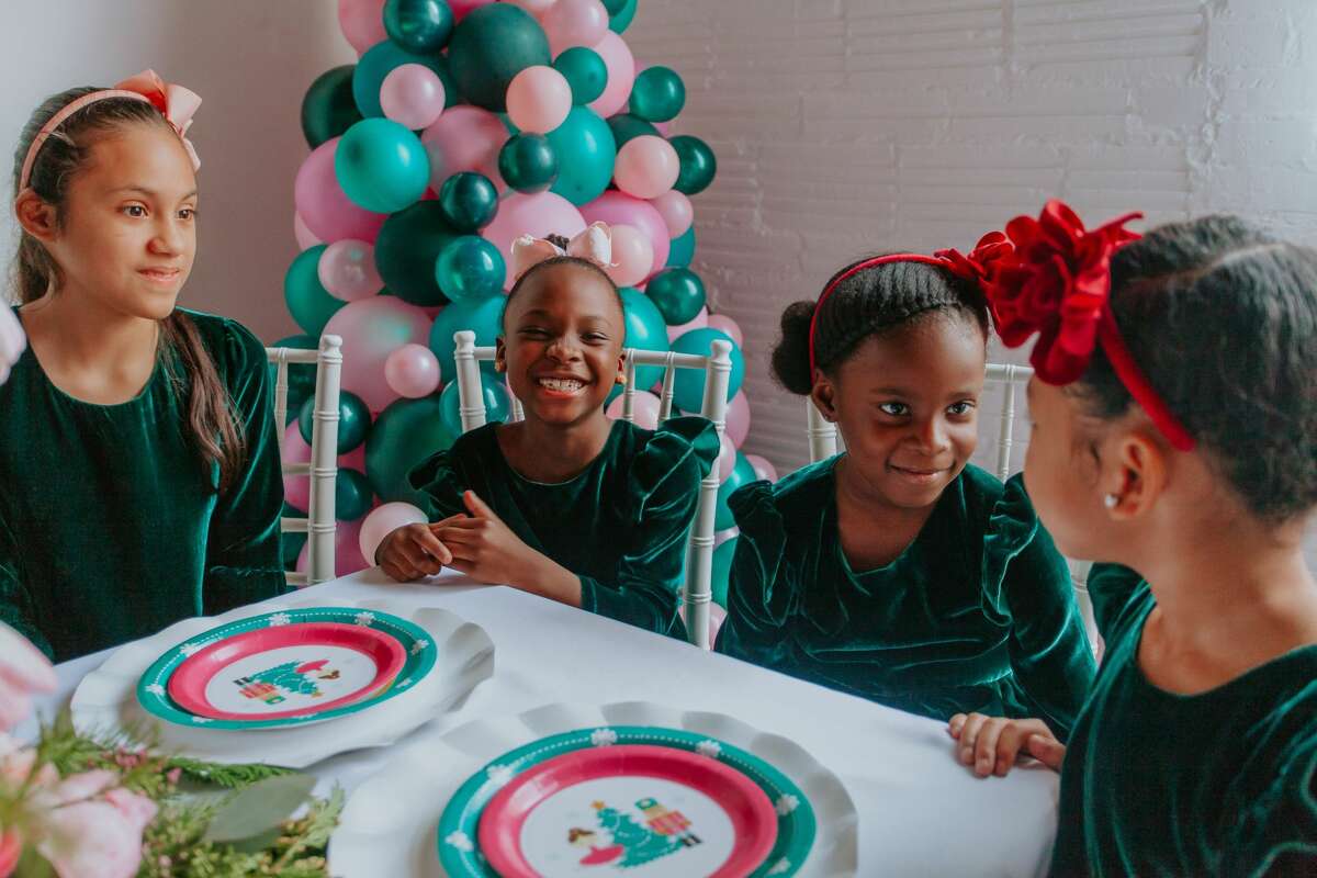 Aaliyah Leon, 10, Lily Howe, 7, Brielle Brown, 6, Mari Grays, 5, and  wear the "Joy" dress by Cuteheads designer Esther Freedman. The girls are part of Hype Freedom School.