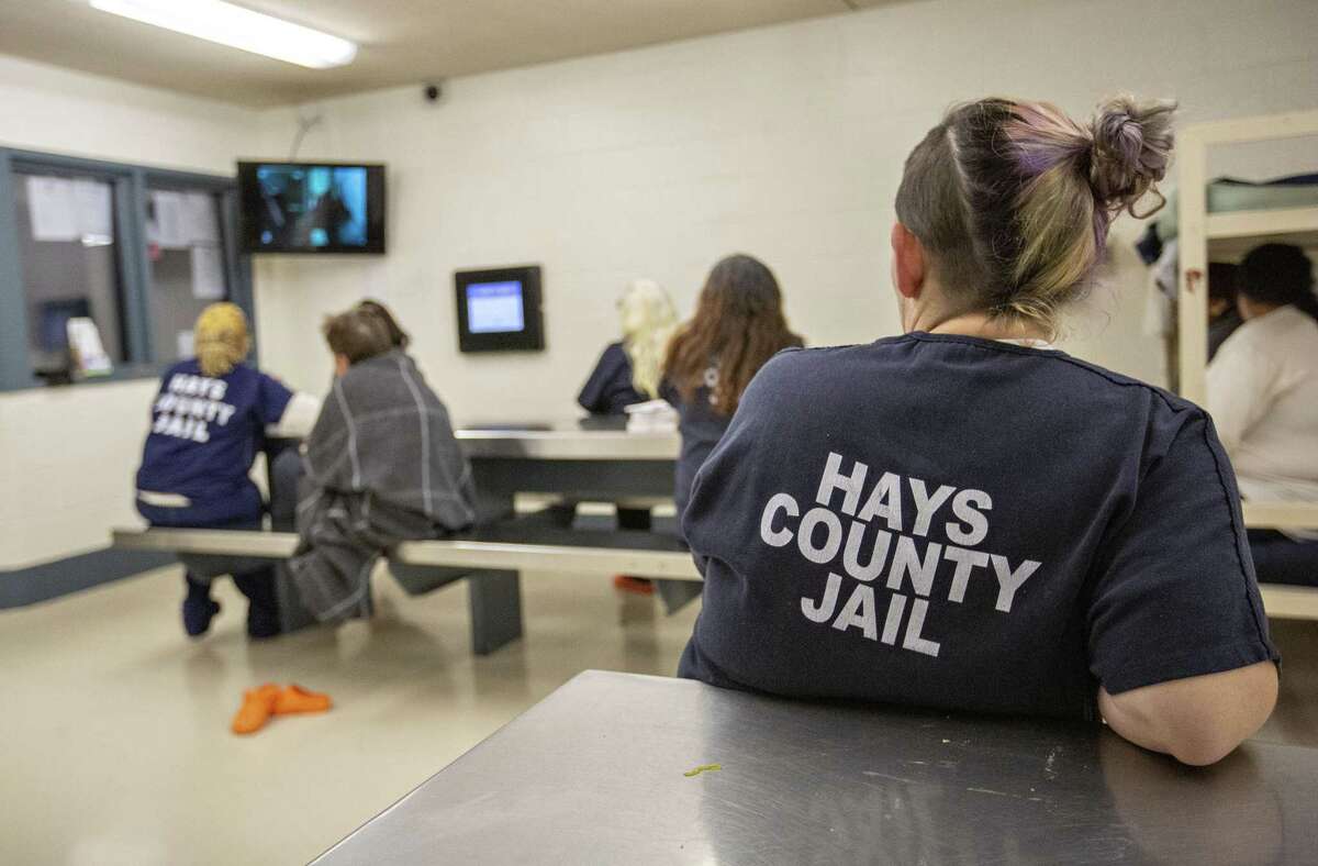 Some female inmates watch the television in C2 dormitory at the Hays County Jail on December 20, 2018 in San Marcos, Texas.