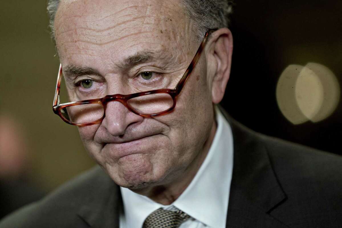 Senate Minority Leader Chuck Schumer, a Democrat from New York, pauses during a news conference at the U.S. Capitol in Washington, D.C., U.S., on Thursday, Dec. 20, 2018. President Donald Trump insisted on funding a wall or other barrier along the southern U.S. border as tensions over a possible partial government shutdown intensified in the wake of the presidents refusal to sign a stopgap spending bill. Photographer: Andrew Harrer/Bloomberg