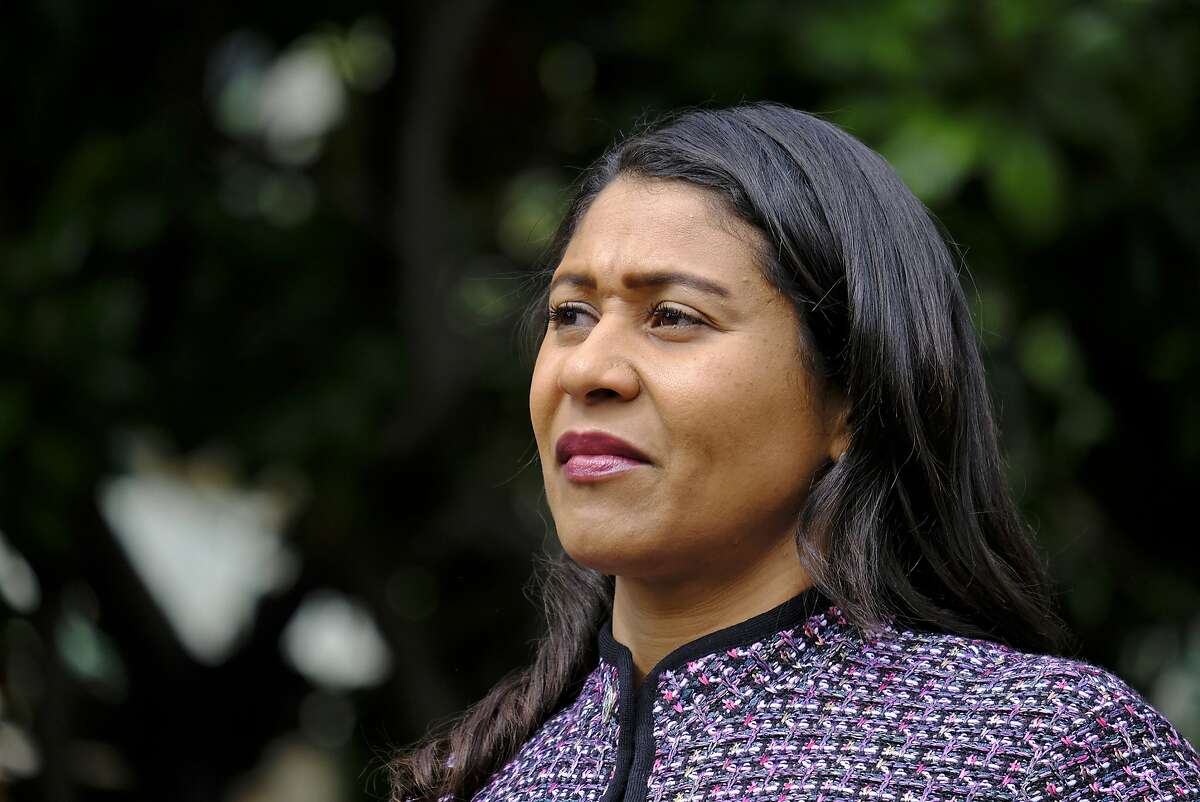 FILE - In this Oct. 2, 2018, file photo, San Francisco Mayor London Breed listens during a news conference in San Francisco. Breed has requested an early release from prison for an older brother who has served nearly two decades of a 44-year sentence for a manslaughter conviction. The San Francisco Chronicle reported Wednesday, Dec. 19, 2018, that Breed sent a letter to outgoing Gov. Jerry Brown in late October asking him to "consider leniency" and commute her brother's sentence. (AP Photo/Eric Risberg, File)