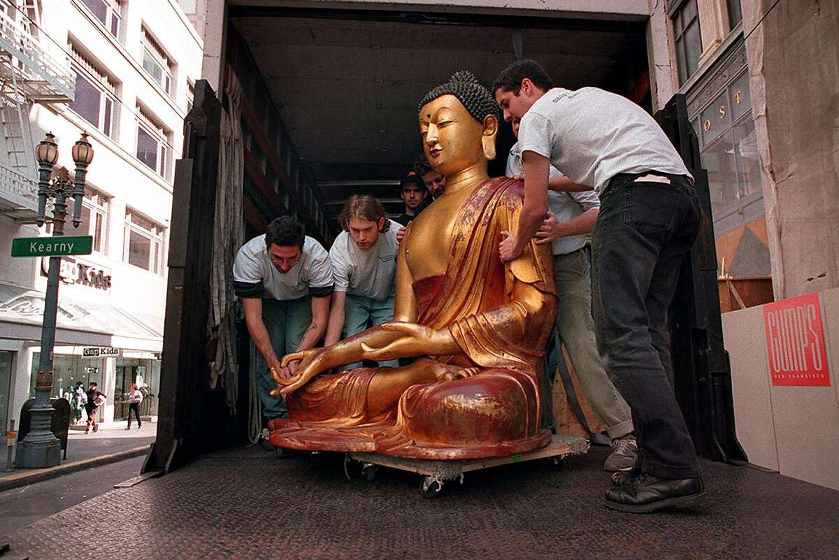 WORKERS BROUGHT OUT THE RESTORED BUDDHA STATUE TO GUMP'S NEW STORE ON POST STREET. PHOTO BY BRANT WARD/THE CHRONICLE