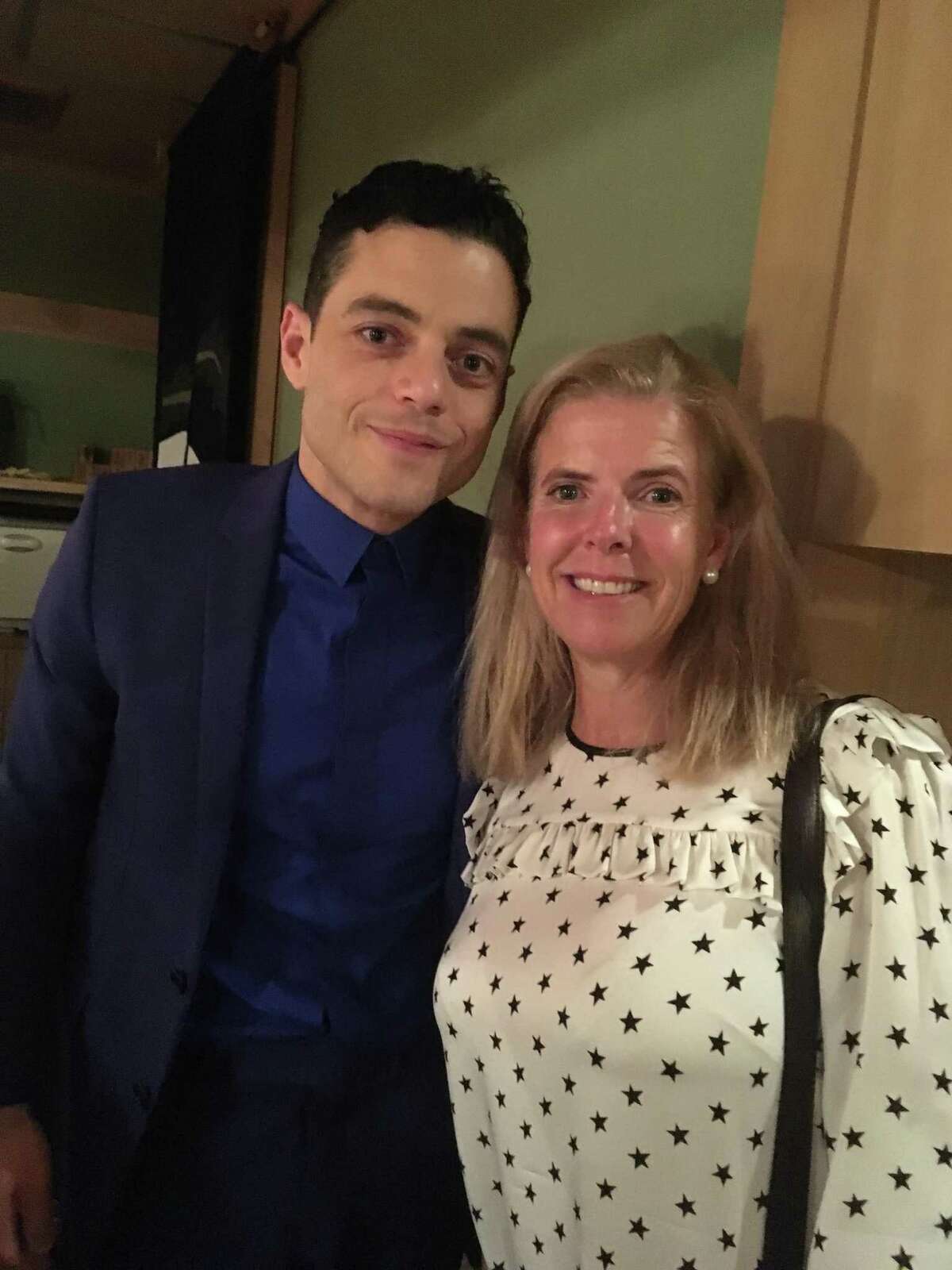 Riverside resident Kathleen Bellissimo with actor Rami Malek, who plays Queen lead singer Freddie Mercury in “Bohemian Rhapsody,” at the film's Japanese premiere at the Roppongi Hills Theater in Tokyo.