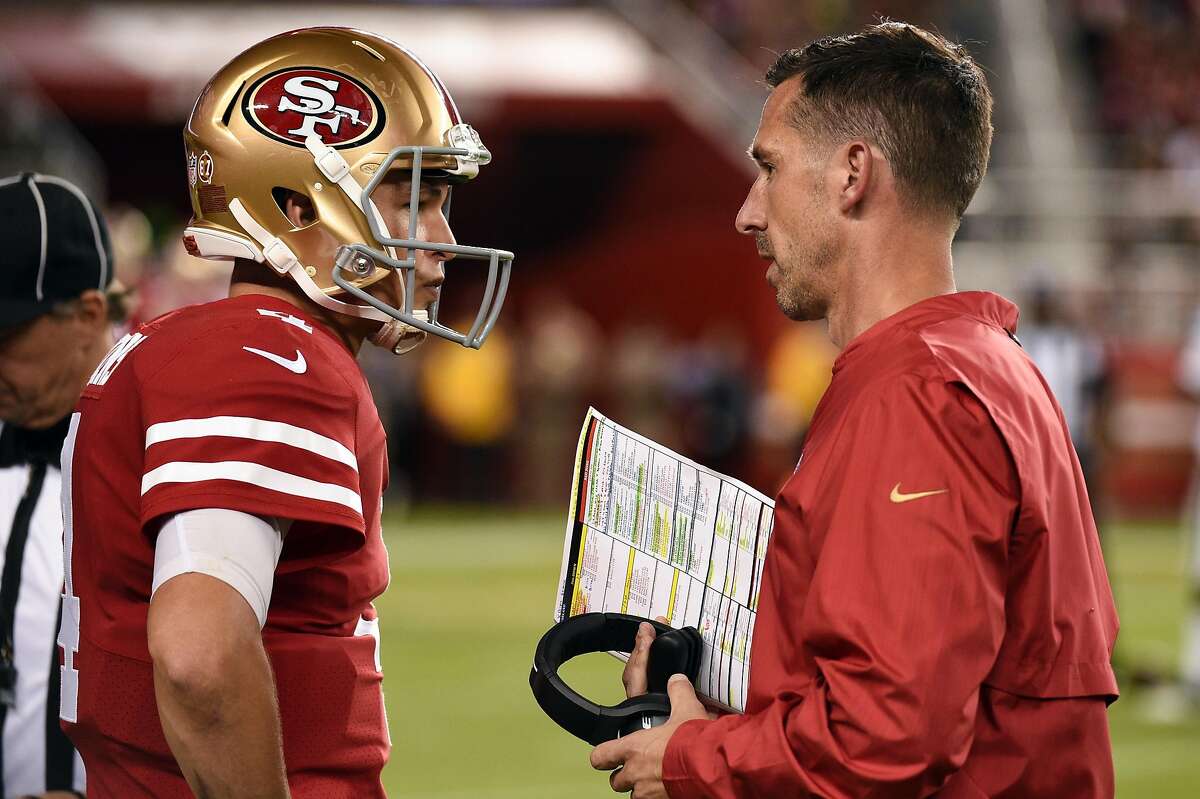 SAN FRANCISCO, CA - NOVEMBER 01: San Francisco 49ers Quarterback Nick Mullens (4) in conversation with San Francisco 49ers Head Coach Kyle Shanahan during the NFL football game between the Oakland Raiders and the San Francisco 49ers on November 1, 2018, at Levi's Stadium in Santa Clara, CA. (Photo by Cody Glenn/Icon Sportswire via Getty Images)