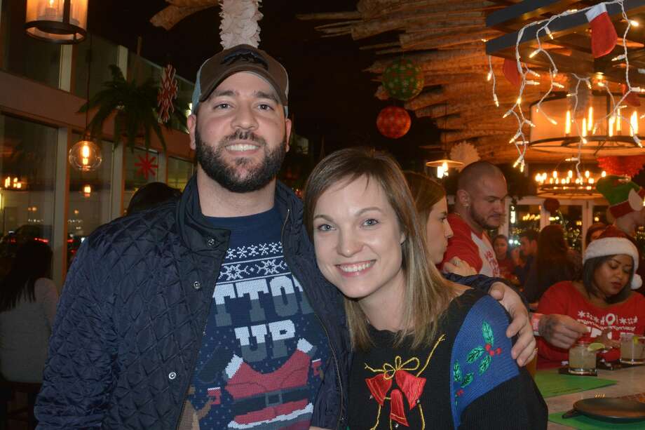 participants donned ugly sweaters and enjoyed drink specials at