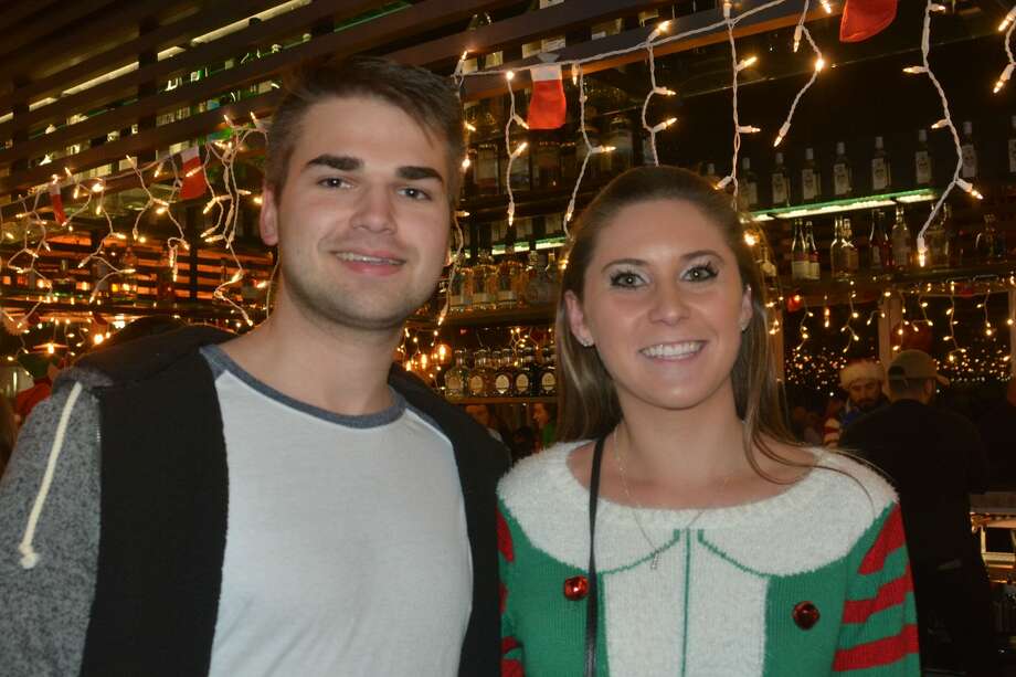 participants donned ugly sweaters and enjoyed drink specials at