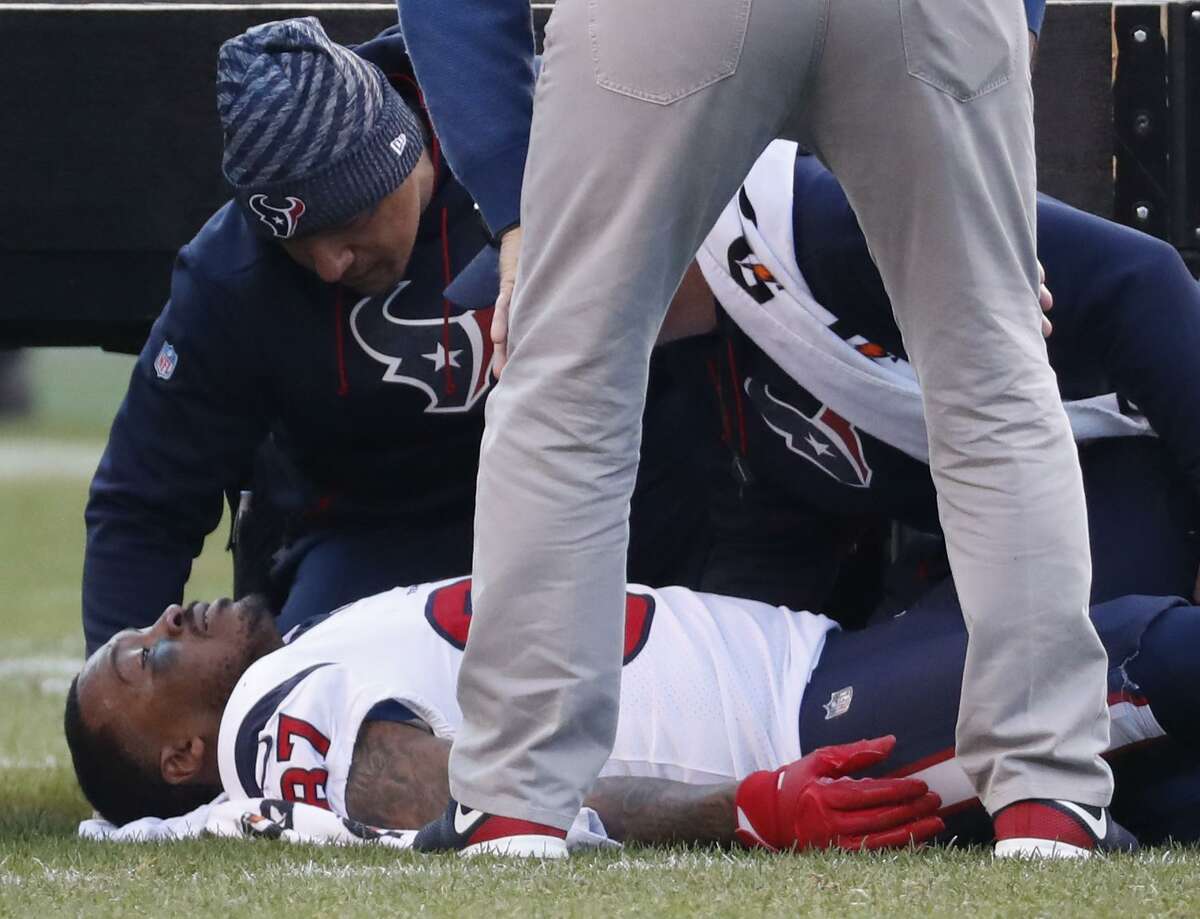 Houston Texans wide receiver Demaryius Thomas (87) lies on the field after suffering an injury against the Philadelphia Eagles during the fourth quarter of an NFL football game at Lincoln Financial Field on Sunday, Dec. 23, 2018, in Philadelphia.