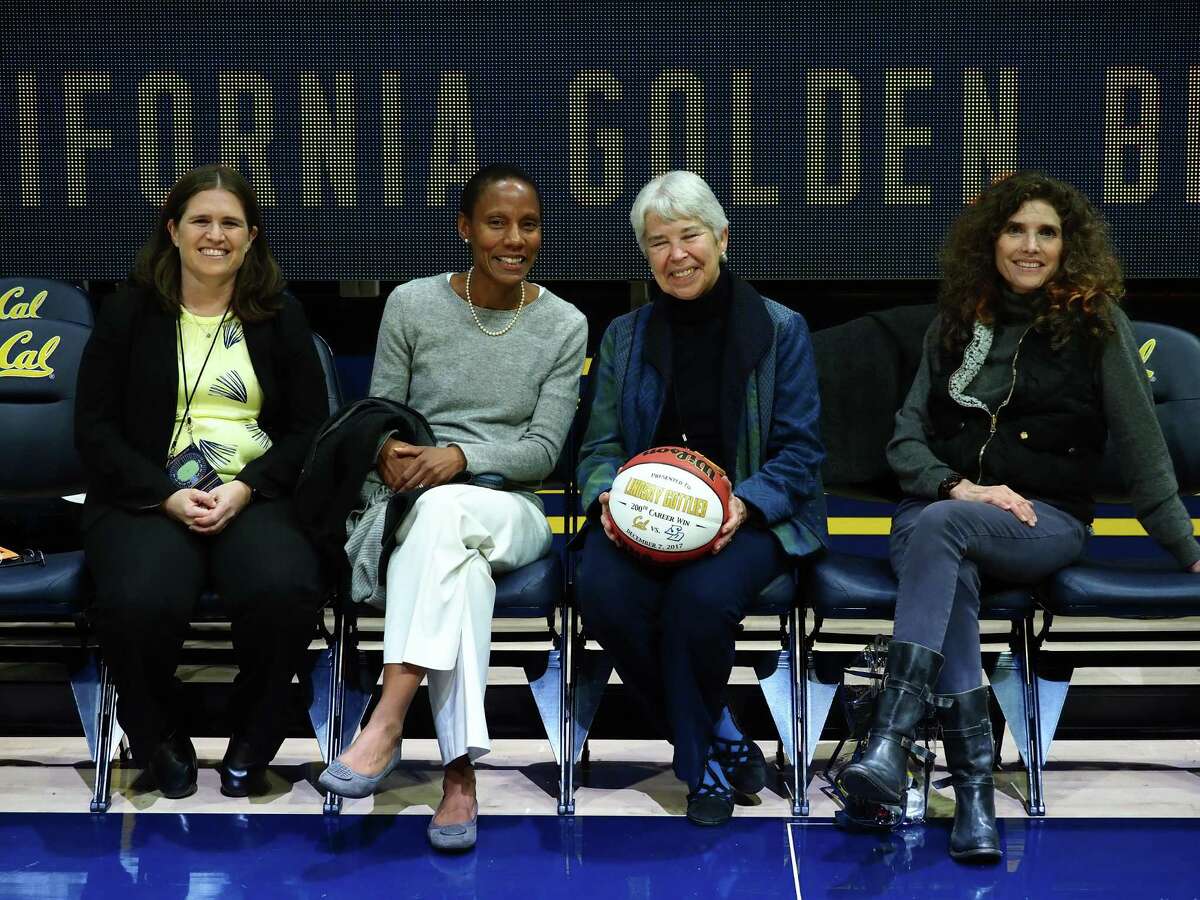 (From left) Jenny Simon-O'Neill, Vice Chancellor Khira Griscavage, and Chancellor Carol Christ at a January women’s basketball game at Haas Pavilion.
