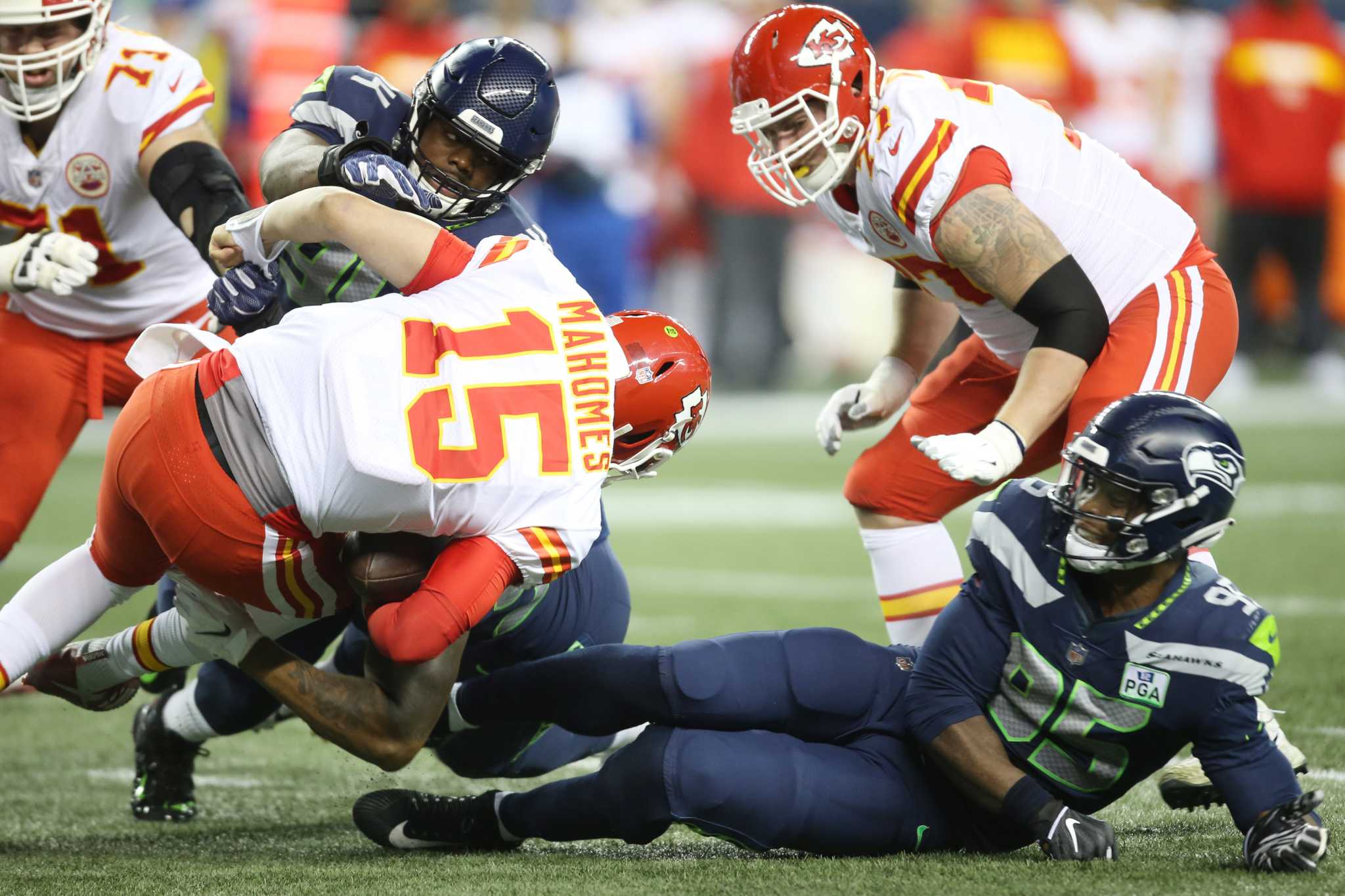 Seahawks clinch playoff berth outlasting Chiefs 38-31