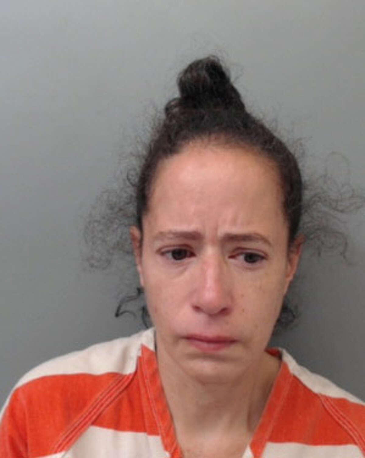Ana Rosa Marrero Jimenez, 46, was charged with injury to an elderly person, interference with an emergency call, possession of a controlled substance and resisting arrest.