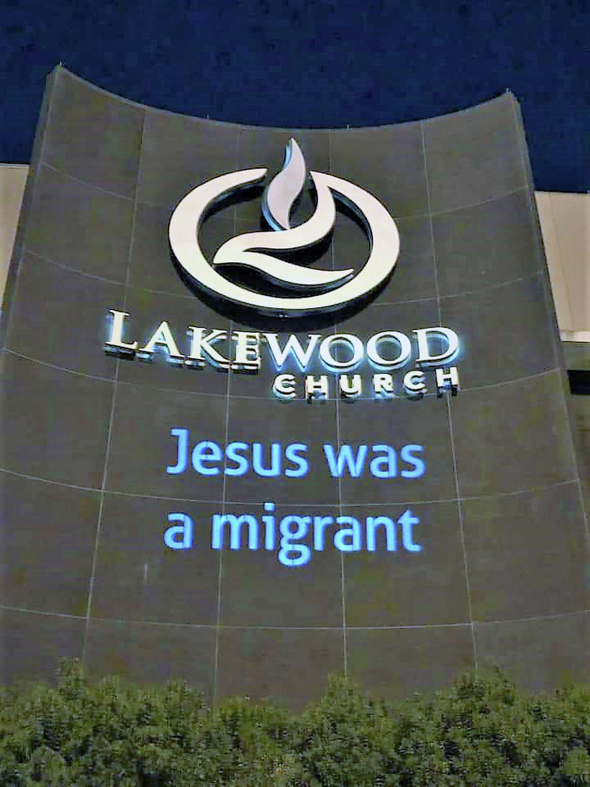 Indivisible Houston projects the message "Jesus was a migrant" on the front sign at Lakewood Church. The group was asked to leave by a security guard and two officers. >>> Click through to see more messages projected on local buildings by Indivisible Houston.