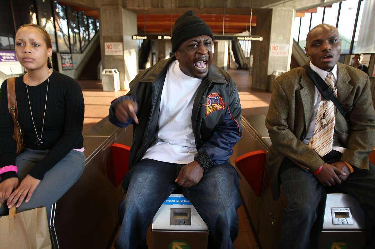 Mandingo, (center) and others managed to shut down the Fruitvale BART station, on Wednesday Jan. 7, 2009, in Oakland, Calif., as hundreds protested the shooting death of Oscar Grant by a BART police officer.