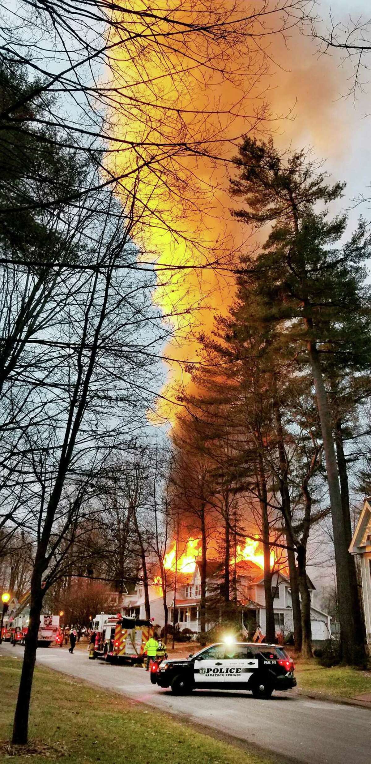 A column of fire rises from 23-27 Sarazen Way Wednesday Dec. 24, 2018 in Saratoga Springs, N.Y. (Special to the Times Union by Janine Rome)