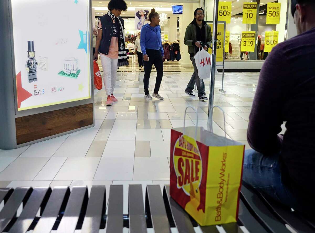 Shoppers make their between stores at Crossgates Mall on Wednesday, Dec. 26, 2018, in Colonie, N.Y. (Paul Buckowski/Times Union)